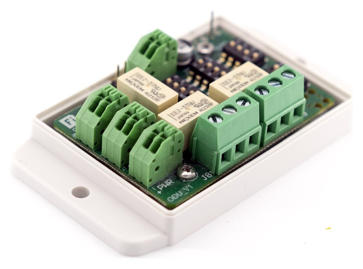 Angled view of the PQCA1 board and its pluggable screw terminals